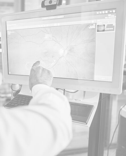 Doctor looking over a retinal scan